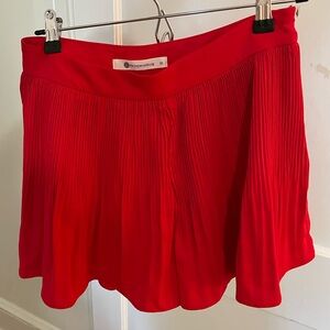 Red Pleated Mini Shorts that look like a skirt